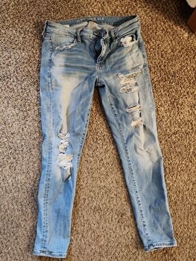 American Eagle Outfitters Super Stretch Light Blue Ripped Skinny Jeans
